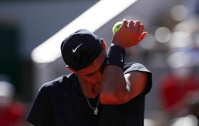 (210602) -- PARIS, June 2, 2021 -- Alexei Popyrin of Australia reacts during the men s singles first round match between Rafael Nadal of Spain and Alexei Popyrin of Australia at the French Open tennis tournament at Roland Garros in Paris, France, June 1, 2021. ) (SP)FRANCE-PARIS-TENNIS-ROLAND GARROS-FRENCH OPEN-MEN S SINGLES GaoxJing 