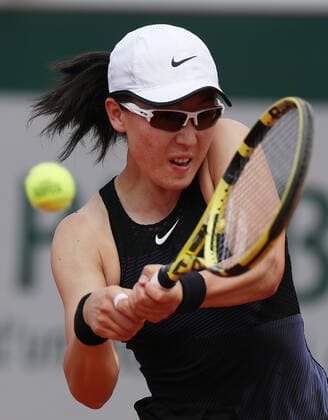 (210603) -- PARIS, June 3, 2021 -- Zheng Saisai of China competes during the women s singles second round match between Zheng Saisai of China and Marta Kostyuk of Ukraine at the French Open tennis tournament at Roland Garros in Paris, France, June 3, 2021. ) (SP)FRANCE-PARIS-TENNIS-ROLAND GARROS-FRENCH OPEN-WOMEN S SINGLES-DAY 5 GaoxJing 