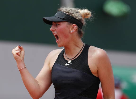 (210603) -- PARIS, June 3, 2021 -- Marta Kostyuk of Ukraine reacts during the women s singles second round match between Zheng Saisai of China and Marta Kostyuk of Ukraine at the French Open tennis tournament at Roland Garros in Paris, France, June 3, 2021. ) (SP)FRANCE-PARIS-TENNIS-ROLAND GARROS-FRENCH OPEN-WOMEN S SINGLES-DAY 5 GaoxJing 