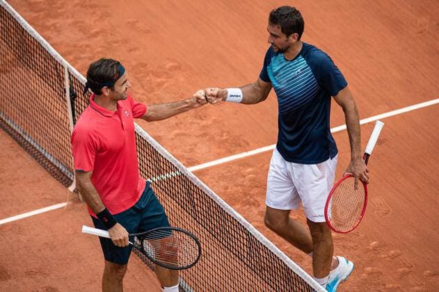 Roger FEDERER of Switzerland and Marin CILIC of Croatia shake hands after the match on the second round of the French Open tennis tournament at Roland Garros in Paris, France, 3 June 2021. Roland Garros 2021 will run from 30 May to 13 June 2021.  Copyright: xAurelienxMorissardx
