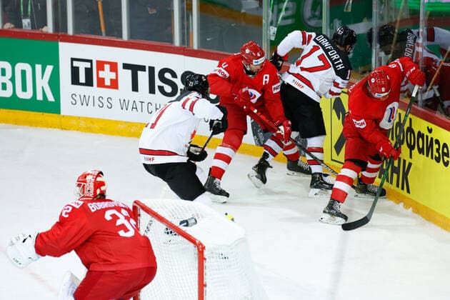 03 06 2021, Riga, Olympic Sports Centre, Quarterfinal Russia Canada 2021 IIHF Ice Hockey World Championship , 21 Nick Paul Canada , 4 Vladislav Gavrikov Russia , 17 Justin Danforth Canada , 8 Ivan Morozov Russia fighting for the puck Riga Riga Latvia  Copyright: xJustPictures.ch JarixPestelaccix