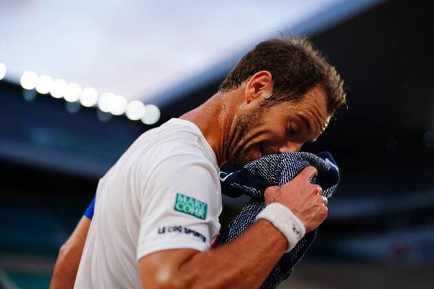Mandatory Credit: Photo by Javier Garcia BPI Shutterstock (12010909ku) Richard Gasquet uses his towel as he struggles early on French Open Tennis, Day Five, Roland Garros, Paris, France - 03 Jun 2021 French Open Tennis, Day Five, Roland Garros, Paris, France - 03 Jun 2021  Copyright: xJavierxGarcia BPI Shutterstockx 12010909ku