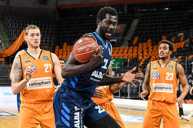 GER, BBL, Play offs, ratiopharm ulm vs Alba Berlin 03 06 2021, ratiopharm arena, Neu Ulm, GER, BBL, Play offs, ratiopharm ulm vs Alba Berlin, in picture Jean Marc Christ Koumadje Berlin, 21 gets the ball against Dylan Osetkowski Ulm, 21 , Troy Caupain Ulm, 23 in the background nordphotoxGmbHx xHafner nph00200