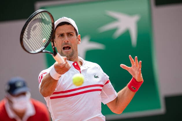 (210604) -- PARIS, June 4, 2021 -- Novak Djokovic of Serbia returns the ball during the men s singles second round match against Pablo Cuevas of Uruguay at the French Open tennis tournament at Roland Garros in Paris, France, June 3, 2021. (Photo by Xinhua) (SP)FRANCE-PARIS-TENNIS-ROLAND GARROS-FRENCH OPEN-MEN S SINGLES-DAY 5 AurelienxMorissard 