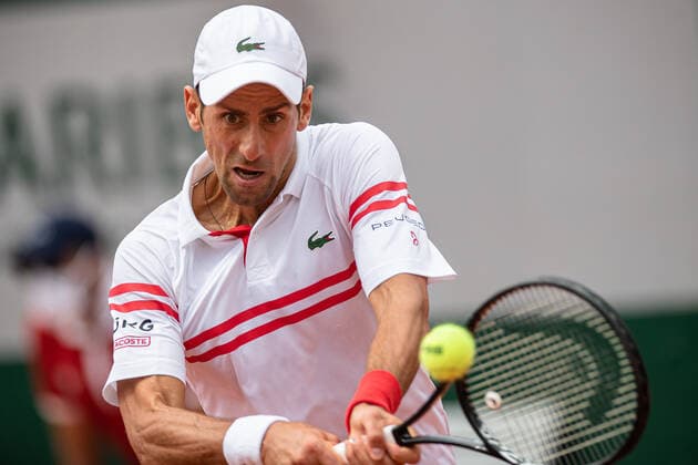 (210604) -- PARIS, June 4, 2021 -- Novak Djokovic of Serbia returns the ball during the men s singles second round match against Pablo Cuevas of Uruguay at the French Open tennis tournament at Roland Garros in Paris, France, June 3, 2021. (Photo by Xinhua) (SP)FRANCE-PARIS-TENNIS-ROLAND GARROS-FRENCH OPEN-MEN S SINGLES-DAY 5 AurelienxMorissard 