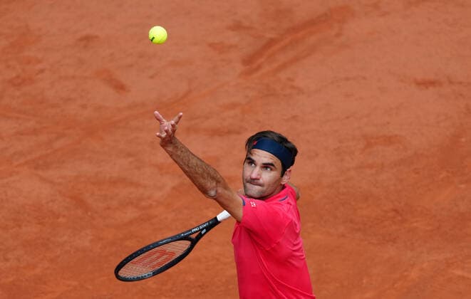 (210604) -- PARIS, June 4, 2021 -- Roger Federer of Switzerland serves the ball during the men s singles second round match against Marin Cilic of Croatia at the French Open tennis tournament at Roland Garros in Paris, France, June 3, 2021. ) (SP)FRANCE-PARIS-TENNIS-ROLAND GARROS-FRENCH OPEN-MEN S SINGLES-DAY 5 GaoxJing 