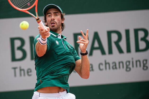 (210604) -- PARIS, June 4, 2021 -- Pablo Cuevas of Uruguay returns the ball during the men s singles second round match against Novak Djokovic of Serbia at the French Open tennis tournament at Roland Garros in Paris, France, June 3, 2021. (Photo by Xinhua) (SP)FRANCE-PARIS-TENNIS-ROLAND GARROS-FRENCH OPEN-MEN S SINGLES-DAY 5 AurelienxMorissard 