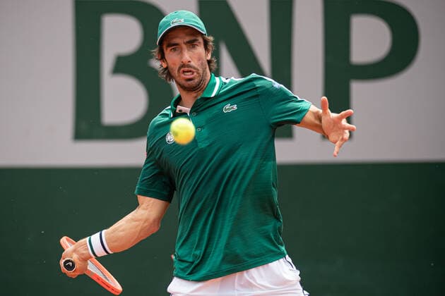 (210604) -- PARIS, June 4, 2021 -- Pablo Cuevas of Uruguay returns the ball during the men s singles second round match against Novak Djokovic of Serbia at the French Open tennis tournament at Roland Garros in Paris, France, June 3, 2021. (Photo by Xinhua) (SP)FRANCE-PARIS-TENNIS-ROLAND GARROS-FRENCH OPEN-MEN S SINGLES-DAY 5 AurelienxMorissard 