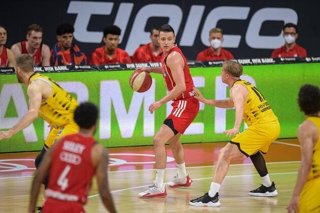 Basketball, BBL, 20210604, FC Bayern München MHP RIESEN Ludwigsburg In the picture Zan Mark SISKO FC Bayern München, 31 and Lukas HERZOG MHP Riesen Ludwigsburg, 11 Munich Audi Dome Bayern Germany Copyright: Passion2Press MarkusxFischerx