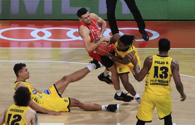 04 06 2021, BBL Play off, FCB Basketball vs Ludwigsburg, Audi Dome Muenchen , pictured Jonah Radebaugh Ludwigsburg Giants , Oscar da Silva Ludwigsburg Giants on the floor, Wade Baldwin FCB Basketball fouled by Jalen Smith Ludwigsburg Giants and Yorman Polas Bartolo Ludwigsburg Giants.