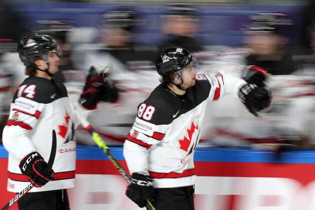 RIGA, LATVIA - JUNE 5, 2021: Adam Henrique (L) and Andrew Mangiapane of Canada celebrate scoring in a 2021 IIHF World Championship, WM, Weltmeisterschaft semifinal match against the USA at Arena Riga. Natalia Fedosenko TASS  TS103C09