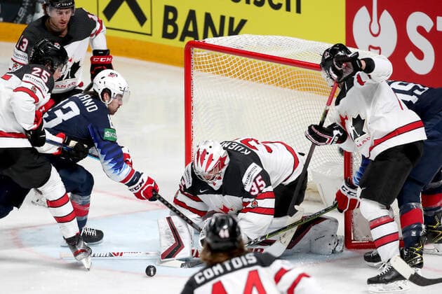 RIGA, LATVIA - JUNE 5, 2021: Owen Power of Canada, Gabriel Vilardi of Canada, Colin Blackwell of the USA, coalie Darcy Kuemper (L-R) of Canada are in action in their 2021 IIHF World Championship, WM, Weltmeisterschaft semifinal match at Arena Riga. Natalia Fedosenko TASS  TS103C0C