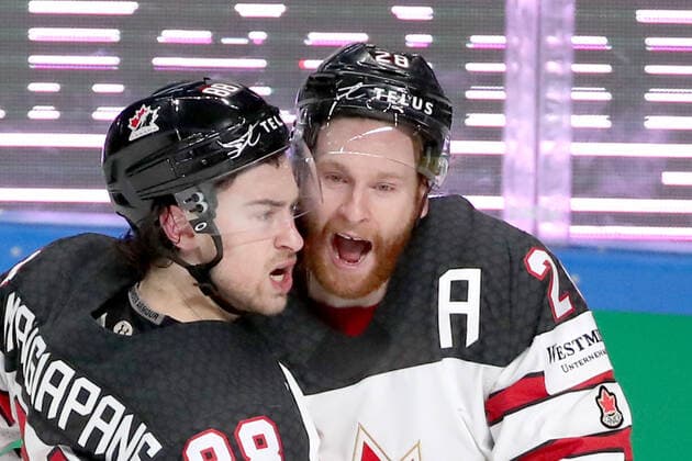 RIGA, LATVIA - JUNE 5, 2021: Andrew Mangiapane (L) of Canada and Connor Brown of Canada celebrate scoring in a 2021 IIHF World Championship, WM, Weltmeisterschaft semifinal match against the USA at Arena Riga. Natalia Fedosenko TASS  TS103C4A