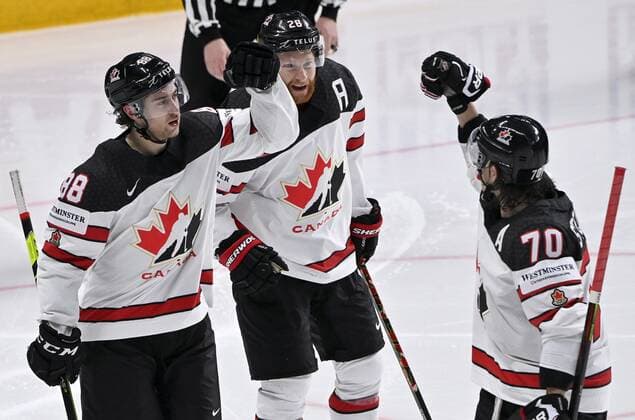 Eishockey, WM, Halbfinale, USA - Kanada From left, Andrew Mangiapane, Connor Brown and Troy Stecher of Canada calebrate 2-3 goal by Mangiapane during semi-final match USA vs Canada at the 2021 IIHF Ice hockey, Eishockey World Championships in Riga, Latvia on Saturday, May 5, 2021. Canada won 2-4. Riika, Riga Latvia LKFTJ20210605164136CXJK  Copyright: xJussixNukarix