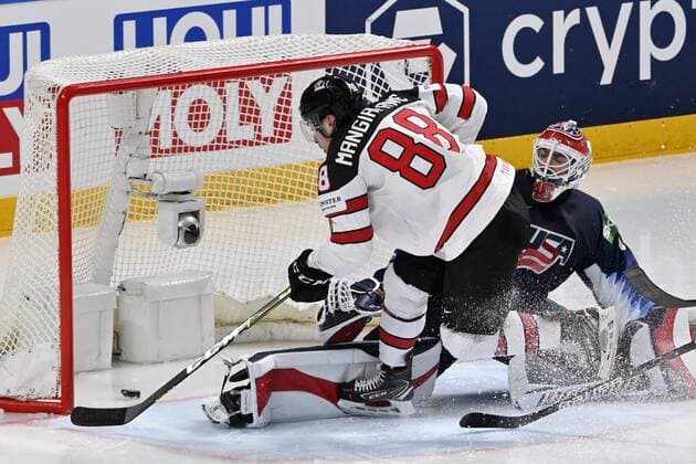Eishockey, WM, Halbfinale, USA - Kanada EDS. NOTE, CORRECTED NAME OF GOALSCORER!! LKS 20210605 Andrew Mangiapane of Canada scores the winning goal 2-3 behind goalkeeper Cal Petersen of USA during semi-final match USA vs Canada at the 2021 IIHF Ice hockey, Eishockey World Championships in Riga, Latvia on Saturday, May 5, 2021. Canada won 2-4. Riika, Riga Latvia LKFTJ20210605164113HQRS  Copyright: xJussixNukarix
