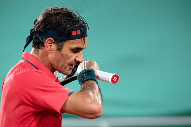 (210606) -- PARIS, June 6, 2021 -- Roger Federer of Switzerland reacts during the men s singles third round match between Roger Federer of Switzerland and Dominik Koepfer of Germany at the French Open tennis tournament at Roland Garros in Paris, France, June 5, 2021. (Photo by Xinhua) (SP)FRANCE-PARIS-TENNIS-ROLAND GARROS-FRENCH OPEN-MEN S SINGLES AurelienxMorissard 