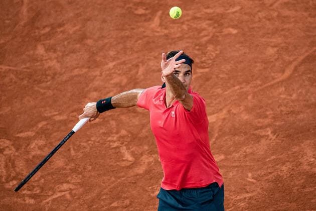 (210606) -- PARIS, June 6, 2021 -- Roger Federer of Switzerland serves the ball during the men s singles third round match between Roger Federer of Switzerland and Dominik Koepfer of Germany at the French Open tennis tournament at Roland Garros in Paris, France, June 5, 2021. (Photo by Xinhua) (SP)FRANCE-PARIS-TENNIS-ROLAND GARROS-FRENCH OPEN-MEN S SINGLES AurelienxMorissard 