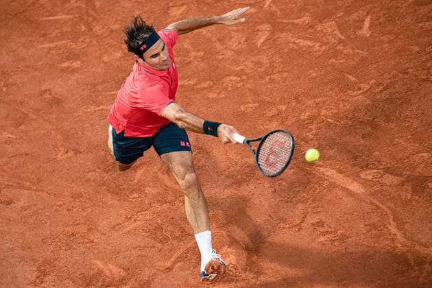 (210606) -- PARIS, June 6, 2021 -- Roger Federer of Switzerland returns the ball during the men s singles third round match between Roger Federer of Switzerland and Dominik Koepfer of Germany at the French Open tennis tournament at Roland Garros in Paris, France, June 5, 2021. (Photo by Xinhua) (SP)FRANCE-PARIS-TENNIS-ROLAND GARROS-FRENCH OPEN-MEN S SINGLES AurelienxMorissard 