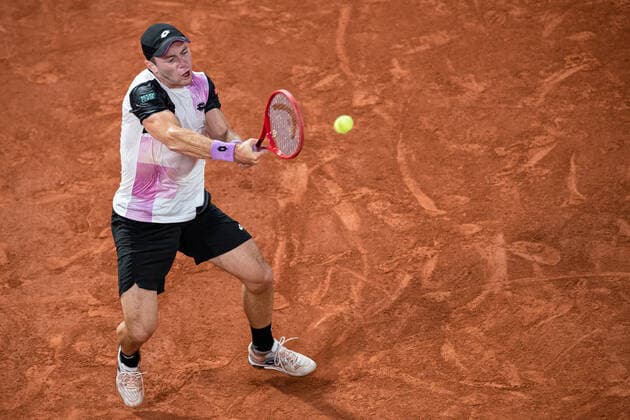 (210606) -- PARIS, June 6, 2021 -- Dominik Koepfer of Germany returns the ball during the men s singles third round match between Roger Federer of Switzerland and Dominik Koepfer of Germany at the French Open tennis tournament at Roland Garros in Paris, France, June 5, 2021. (Photo by Xinhua) (SP)FRANCE-PARIS-TENNIS-ROLAND GARROS-FRENCH OPEN-MEN S SINGLES AurelienxMorissard 