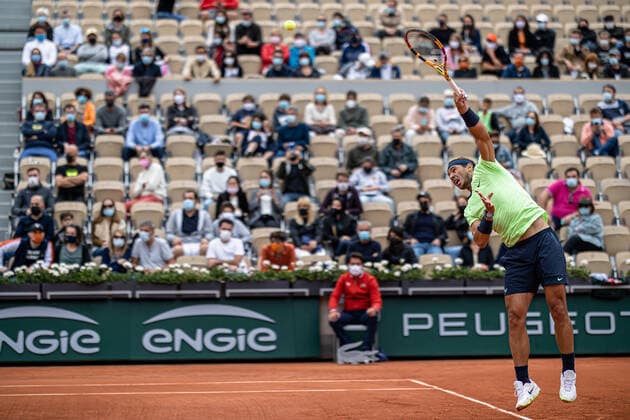 (210606) -- PARIS, June 6, 2021 -- Rafael Nadal serves during the men s singles third round match between Rafael Nadal of Spain and Cameron Norrie of Britain at the French Open tennis tournament at Roland Garros in Paris, France, June 5, 2021. (Photo by Xinhua) (SP)FRANCE-PARIS-TENNIS-ROLAND GARROS-FRENCH OPEN-MEN S SINGLES AurelienxMorissard 
