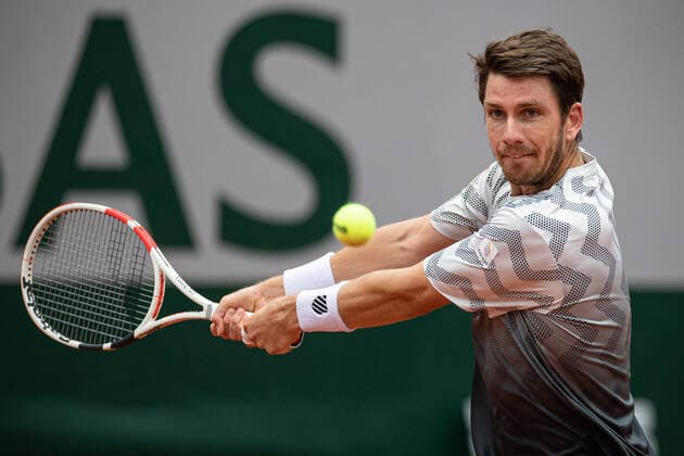 (210606) -- PARIS, June 6, 2021 -- Cameron Norrie returns the ball during the men s singles third round match between Rafael Nadal of Spain and Cameron Norrie of Britain at the French Open tennis tournament at Roland Garros in Paris, France, June 5, 2021. (Photo by Xinhua) (SP)FRANCE-PARIS-TENNIS-ROLAND GARROS-FRENCH OPEN-MEN S SINGLES AurelienxMorissard 