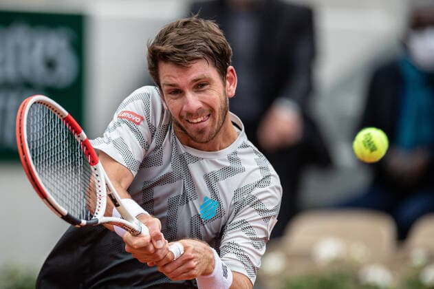 (210606) -- PARIS, June 6, 2021 -- Cameron Norrie returns the ball during the men s singles third round match between Rafael Nadal of Spain and Cameron Norrie of Britain at the French Open tennis tournament at Roland Garros in Paris, France, June 5, 2021. (Photo by Xinhua) (SP)FRANCE-PARIS-TENNIS-ROLAND GARROS-FRENCH OPEN-MEN S SINGLES AurelienxMorissard 