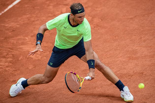 (210606) -- PARIS, June 6, 2021 -- Rafael Nadal returns the ball during the men s singles third round match between Rafael Nadal of Spain and Cameron Norrie of Britain at the French Open tennis tournament at Roland Garros in Paris, France, June 5, 2021. (Photo by Xinhua) (SP)FRANCE-PARIS-TENNIS-ROLAND GARROS-FRENCH OPEN-MEN S SINGLES AurelienxMorissard 