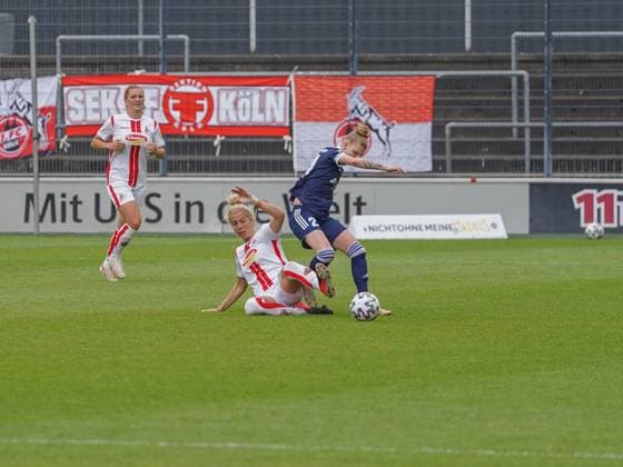 Cologne, Germany, June 6th 2021: Caroline Asteroth (21 SG 99 Andernach) and Sharon Beck (10 1. FC Koeln) during the 2. Womens Bundesliga match between 1. FC Koeln and SG 99 Andernach at the Franz-Kremer-Stadium in Cologne, Germany. 2. Womens Bundesliga South - 1. FC K?ln v SG 99 Andernach 