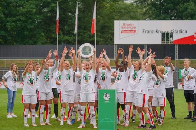 Cologne, Germany, June 6th 2021: 1. FC Koeln after winning the 2. Womens Bundesliga South trophy at the Franz-Kremer-Stadium in Cologne, Germany. 2. Womens Bundesliga South - 1. FC K?ln v SG 99 Andernach 