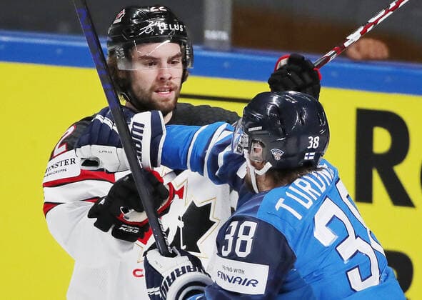 RIGA, LATVIA - JUNE 6, 2021: Finland s Arttu Ruotsalainen (L) and Canada s Mario Ferraro in their 2021 IIHF World Championship, WM, Weltmeisterschaft Final Ice hockey, Eishockey match at Arena Riga. Natalia Fedosenko TASS  TS103E72