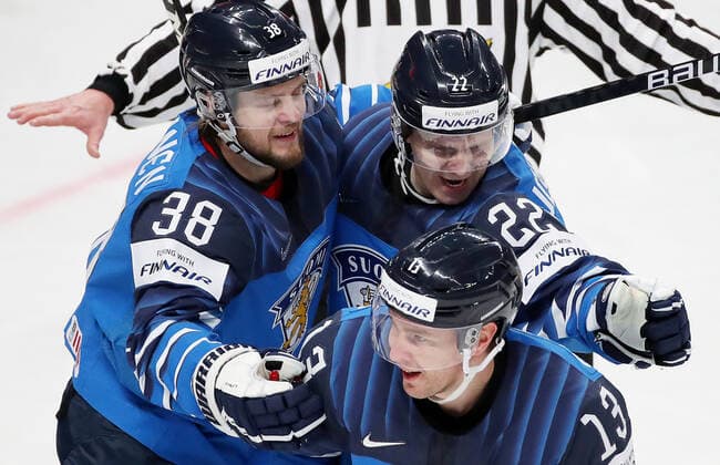 RIGA, LATVIA - JUNE 6, 2021: Finnish players celebrate a goal scored against Canada in their 2021 IIHF World Championship, WM, Weltmeisterschaft Final Ice hockey, Eishockey match at Arena Riga. Natalia Fedosenko TASS  TS103E78
