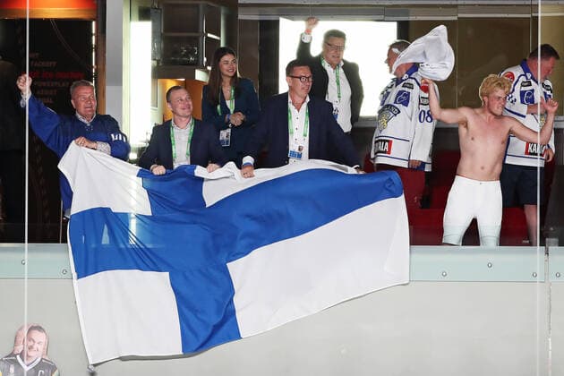 RIGA, LATVIA - JUNE 6, 2021: Finnish fans attend their team s 2021 IIHF World Championship, WM, Weltmeisterschaft Final Ice hockey, Eishockey match against Canada at Arena Riga. Natalia Fedosenko TASS  TS103E7B