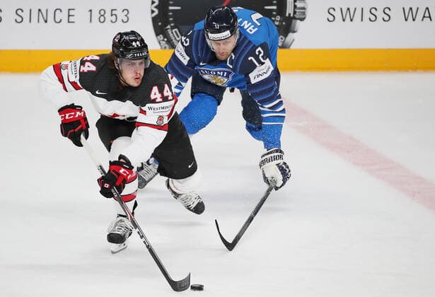 RIGA, LATVIA - JUNE 6, 2021: Canada s Max Comtois (L) and Finland s Marko Anttila in their 2021 IIHF World Championship, WM, Weltmeisterschaft Final Ice hockey, Eishockey match at Arena Riga. Natalia Fedosenko TASS  TS103E7F