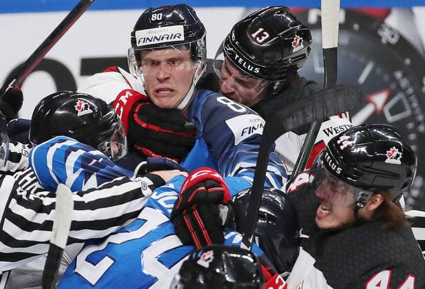 RIGA, LATVIA - JUNE 6, 2021: Players fight in the 2021 IIHF World Championship, WM, Weltmeisterschaft Final Ice hockey, Eishockey match between Finland and Canada at Arena Riga. Natalia Fedosenko TASS  TS103E80