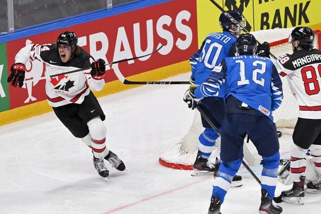 Maxime Comtois of Canada (left) celebrates after scoring 1-1 equalizer during 2021 IIHF Ice hockey, Eishockey World Championships final Finland vs Canada in Riga, Latvia on Sunday, June 6, 2021. On the right are Miika Koivisto (50) and Marko Anttila of Finland and Andrew Mangiapane of Canada. Riika, Riga Latvia LKFTJK20210606211302BEEG  Copyright: xJussixNukarix