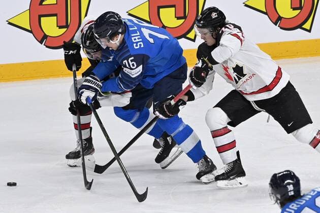 Jere Sallinen of Finland (middle) and Liam Foudy (left) and Troy Stecher of Canada in action during 2021 IIHF Ice hockey, Eishockey World Championships final Finland vs Canada in Riga, Latvia on Sunday, June 6, 2021. Riika, Riga Latvia LKFTJK20210606211929DRXF  Copyright: xJussixNukarix