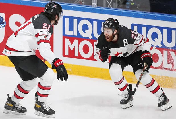 Eishockey, WM, Finale, Kanada ist Weltmeister RIGA, LATVIA - JUNE 6, 2021: Canada s Nick Paul (L) and Connor Brown celebrate victory over Finland in their 2021 IIHF World Championship, WM, Weltmeisterschaft Final Ice hockey, Eishockey match at Arena Riga; Canada won 3-2 in overtime. Natalia Fedosenko TASS  TS103EA9