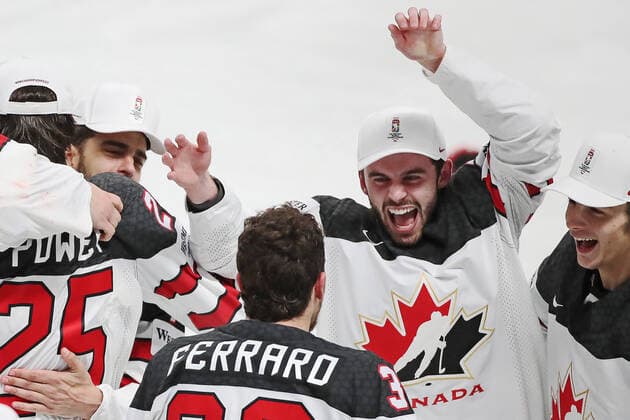 RIGA, LATVIA - JUNE 6, 2021: Canadian players celebrate victory over Finland in their 2021 IIHF World Championship, WM, Weltmeisterschaft Final Ice hockey, Eishockey match at Arena Riga; Canada won 3-2 in overtime. Natalia Fedosenko TASS  TS103EB2