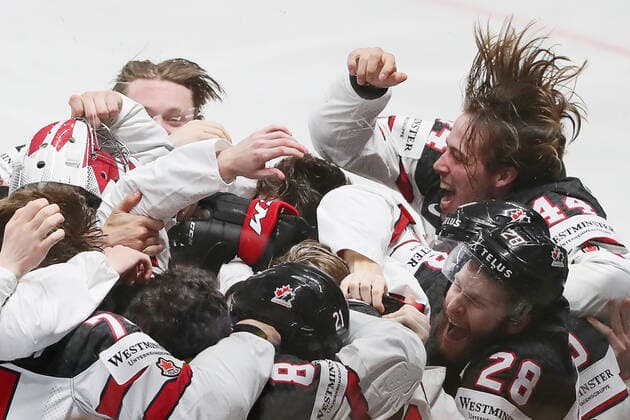 RIGA, LATVIA - JUNE 6, 2021: Canadian players celebrate victory over Finland in their 2021 IIHF World Championship, WM, Weltmeisterschaft Final Ice hockey, Eishockey match at Arena Riga; Canada won 3-2 in overtime. Natalia Fedosenko TASS  TS103EB4