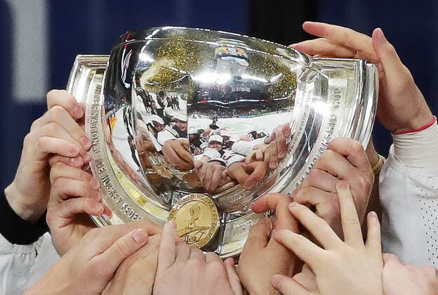 RIGA, LATVIA - JUNE 6, 2021: Canadian players lift their trophy as they celebrate victory over Finland in their 2021 IIHF World Championship, WM, Weltmeisterschaft Final Ice hockey, Eishockey match at Arena Riga; Canada won 3-2 in overtime. Natalia Fedosenko TASS  TS103EB8