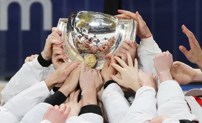 RIGA, LATVIA - JUNE 6, 2021: Canadian players lift their trophy as they celebrate victory over Finland in their 2021 IIHF World Championship, WM, Weltmeisterschaft Final Ice hockey, Eishockey match at Arena Riga; Canada won 3-2 in overtime. Natalia Fedosenko TASS  TS103EB9