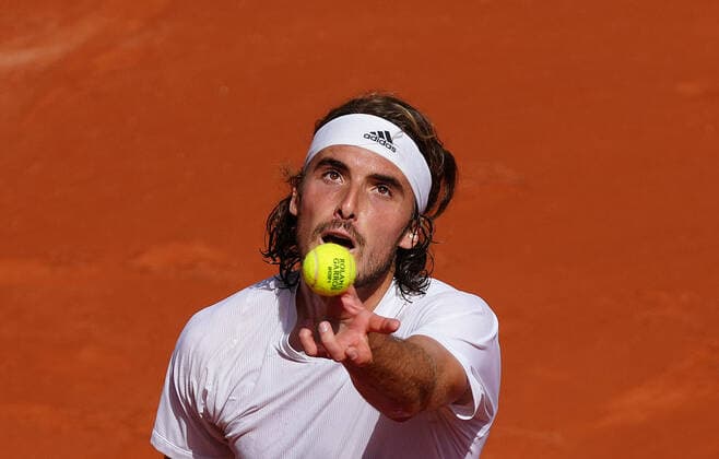 (210607) -- PARIS, June 7, 2021 -- Stefanos Tsitsipas of Greece serves during the men s singles fourth round match between Stefanos Tsitsipas of Greece and Pablo Carreno Busta of Spain at the French Open tennis tournament at Roland Garros in Paris, France, June 6, 2021. ) (SP)FRANCE-PARIS-TENNIS-ROLAND GARROS-FRENCH OPEN-MEN S SINGLES GaoxJing 
