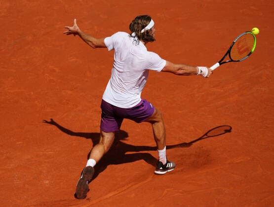 (210607) -- PARIS, June 7, 2021 -- Stefanos Tsitsipas of Greece returns the ball during the men s singles fourth round match between Stefanos Tsitsipas of Greece and Pablo Carreno Busta of Spain at the French Open tennis tournament at Roland Garros in Paris, France, June 6, 2021. ) (SP)FRANCE-PARIS-TENNIS-ROLAND GARROS-FRENCH OPEN-MEN S SINGLES GaoxJing 