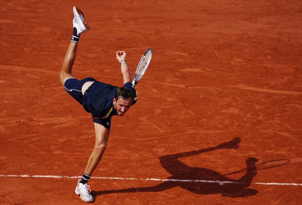 (210607) -- PARIS, June 7, 2021 -- Daniil Medvedev of Russia serves during the men s singles fourth round match between Daniil Medvedev of Russia and Cristian Garin of Chile at the French Open tennis tournament at Roland Garros in Paris, France, June 6, 2021. ) (SP)FRANCE-PARIS-TENNIS-ROLAND GARROS-FRENCH OPEN-MEN S SINGLES GaoxJing 