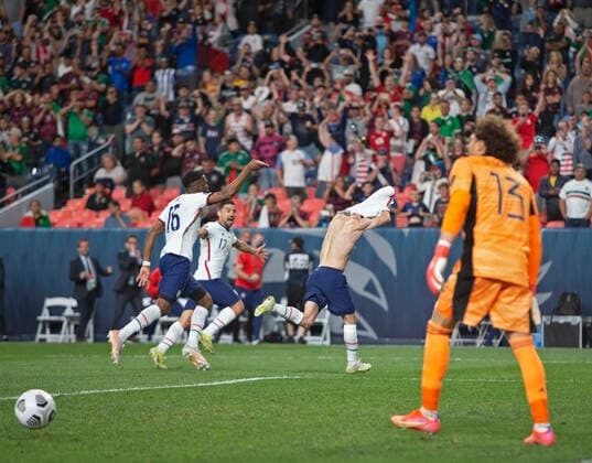 June 6, 2021, Denver, Colorado, U.S: USA CHRISTIAN PULISIC takes his shirt off as he celebrates scoring on a Penalty Kick in Overtime Sunday evening at Empower Field at Mile High. USA beats Mexico 3-2 in Overtime and wins the Inaugural Concacaf Nations League Cup. Denver U.S. - ZUMAav4_ 20210606_zaf_av4_006 Copyright: xHectorxAcevedox