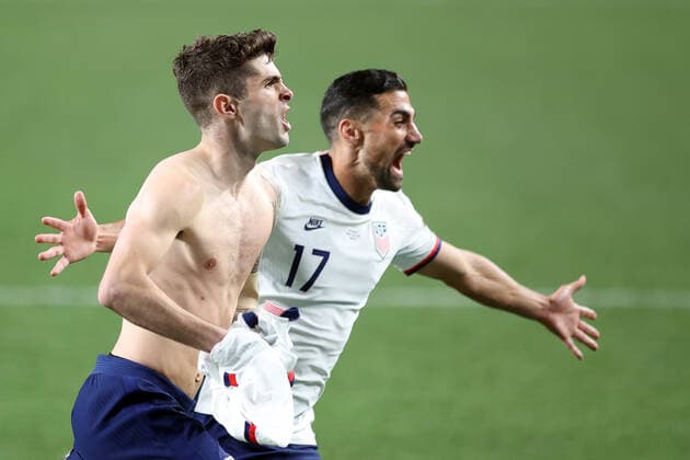 DENVER, CO - JUNE 06: United States forward Christian Pulisic (10) celebrates with United States midfielder Sebastian Lletget (17) and teammates after scoring a goal from a penalty kick in extra time action during the CONCACAF Nations League finals between Mexico and the United States on June 06, 2021, at Empower Field at Mile High in Denver, CO. (Photo by Robin Alam Icon Sportswire) SOCCER: JUN 06 Concacaf Nations League Final - Mexico v United States Icon164210606024