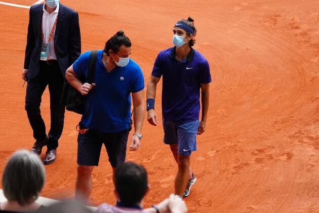 Mandatory Credit: Photo by Javier Garcia BPI Shutterstock (12019129gb) Lorenzo Musetti leaves the court with his physio after the end of the fourth set French Open Tennis, Day Nine, Roland Garros, Paris, France - 07 Jun 2021 French Open Tennis, Day Nine, Roland Garros, Paris, France - 07 Jun 2021  Copyright: xJavierxGarcia BPI Shutterstockx 12019129gb