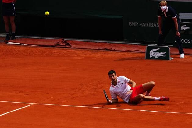Mandatory Credit: Photo by Javier Garcia BPI Shutterstock (12019129gl) Novak Djokovic plays a forehand shot from the ground French Open Tennis, Day Nine, Roland Garros, Paris, France - 07 Jun 2021 French Open Tennis, Day Nine, Roland Garros, Paris, France - 07 Jun 2021  Copyright: xJavierxGarcia BPI Shutterstockx 12019129gl