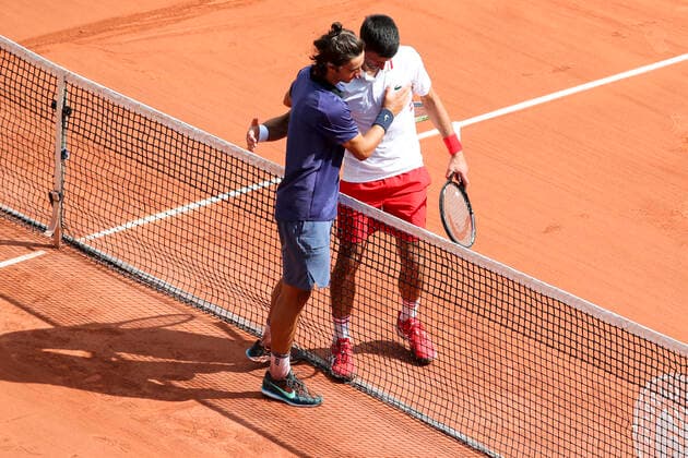 TENNIS - French Open 2021 PARIS,FRANCE,07.June.21 - TENNIS - ATP, Tennis Herren World Tour, French Open, Roland Garros, Grand Slam. Image shows Lorenzo Musetti (ITA) and Novak Djokovic (SRB).  GEPAxpictures xPatrickxSteiner