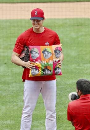 Baseball: Angels Ohtani Shohei Ohtani of the Los Angeles Angels poses with a cushion illustrated with his face before a game against the Kansas City Royals at Angel Stadium in Anaheim, California, on June 7, 2021. 